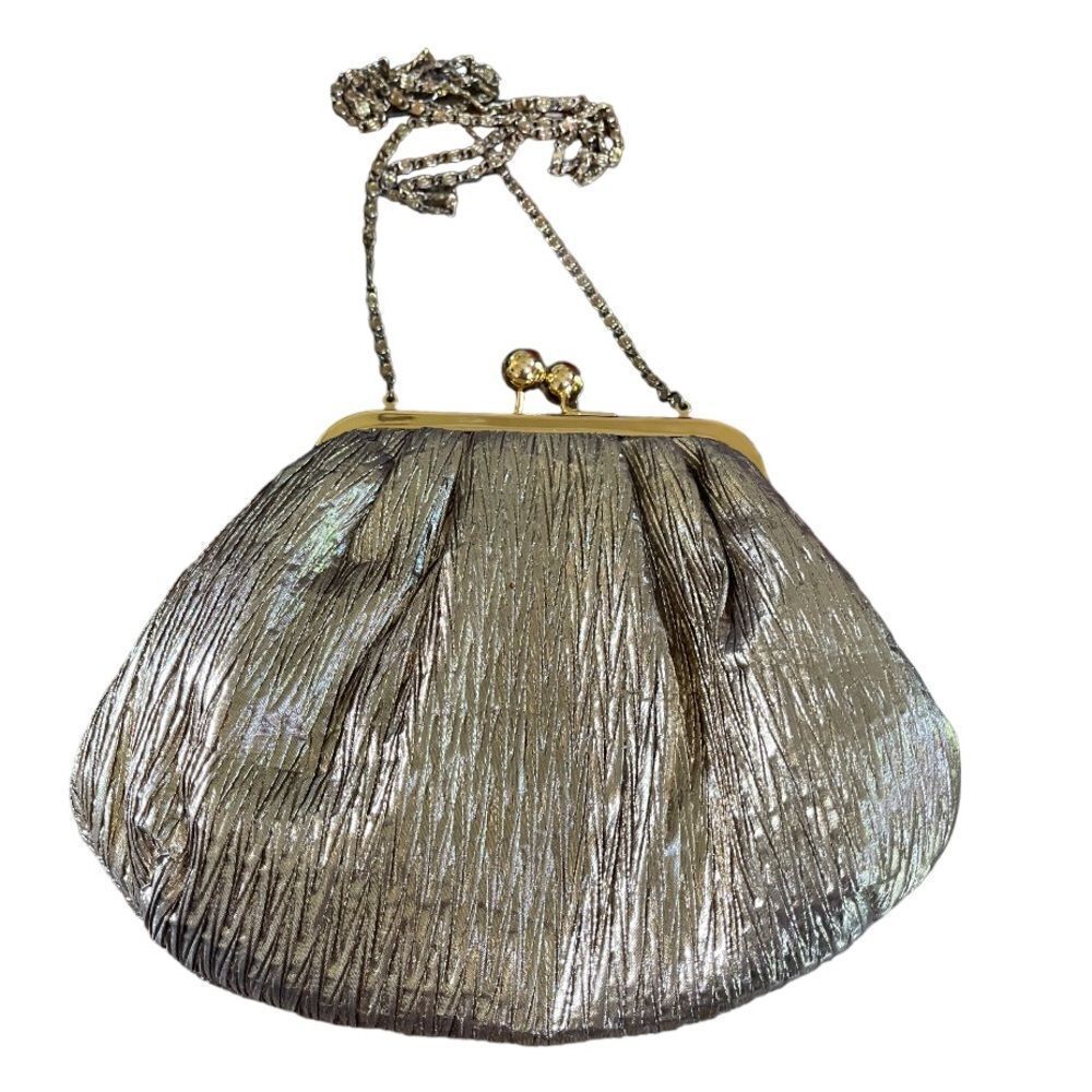 Pre-loved pleated fabric gold tone framed clutch with chain cross body strap.